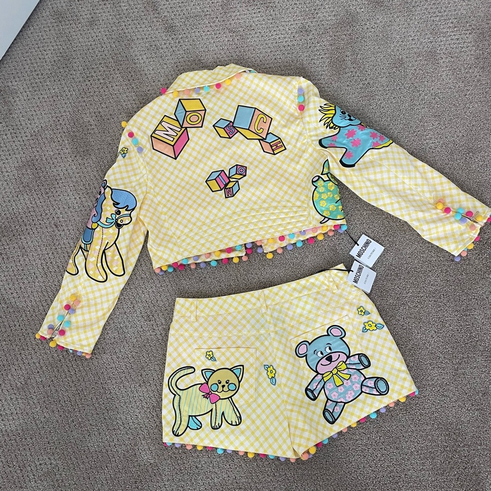 Moschino Couture Jeremy Scott brings Nursery Rhymes to life Suit
